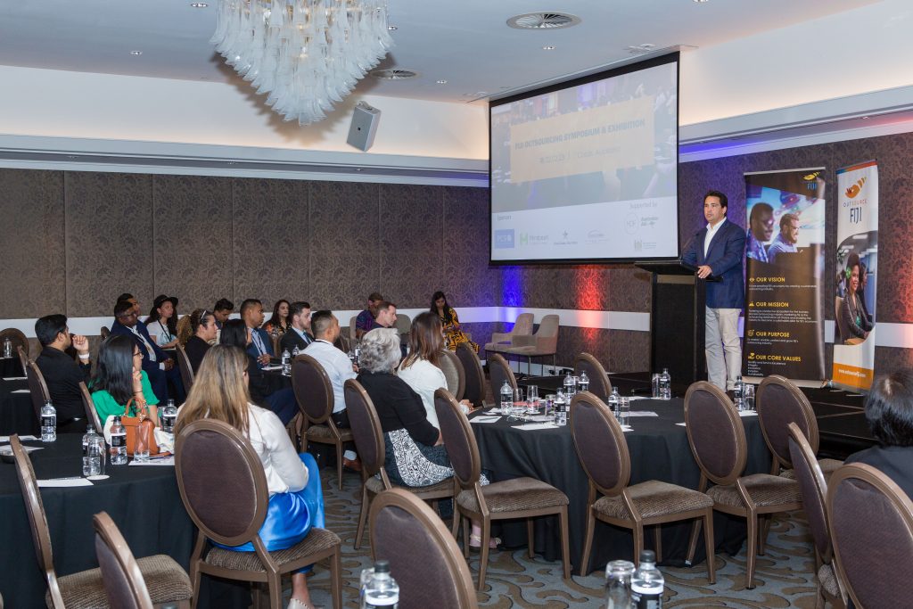 Simon Bridges presenting at the Outsource Fiji Symposium and Exhibition