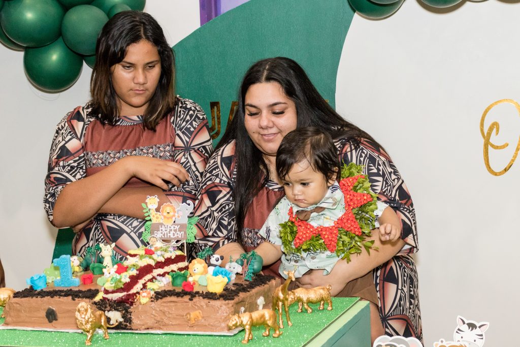 Tongan First Birthday Cake Cutting Photo