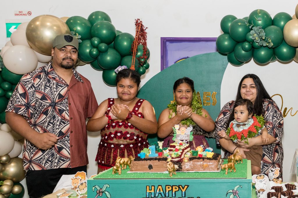 Tongan First Birthday Family Photo With Cake 1