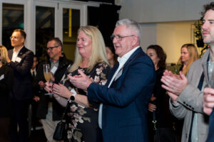 Company Rebranding Cocktail Evening Audience Applauding